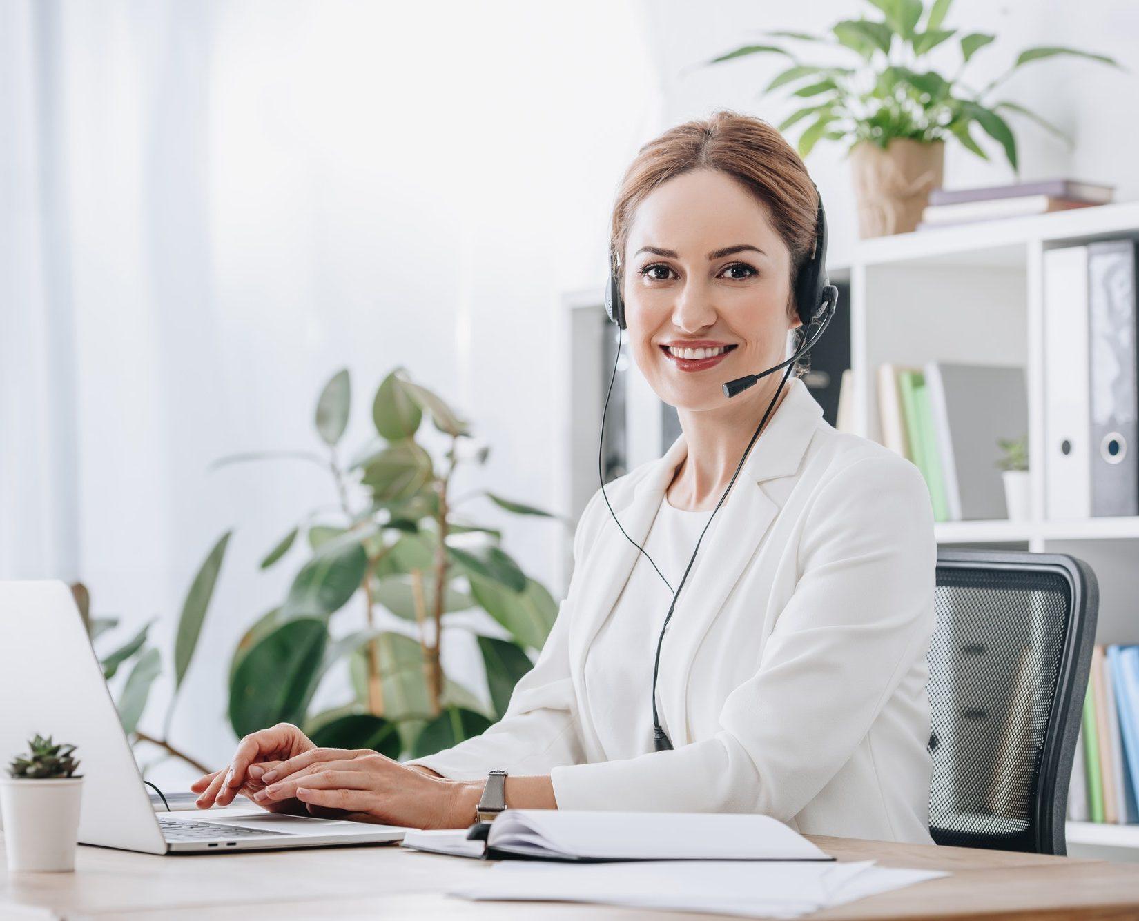 support-operator-working-with-headset-and-laptop-in-call-center